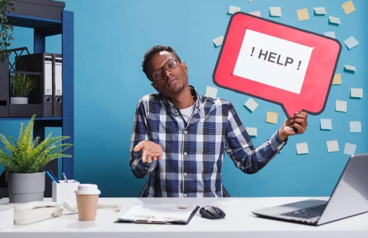 confused-business-owner-holding-help-sign-wondering-do-I-need-an-accountant-for-a-limited-company